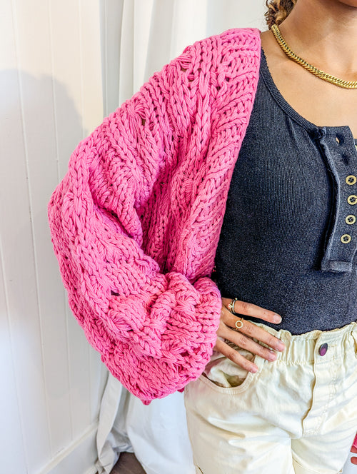 Bright pink knit open front cardigan