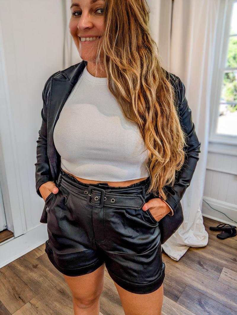 Black faux leather belted shorts