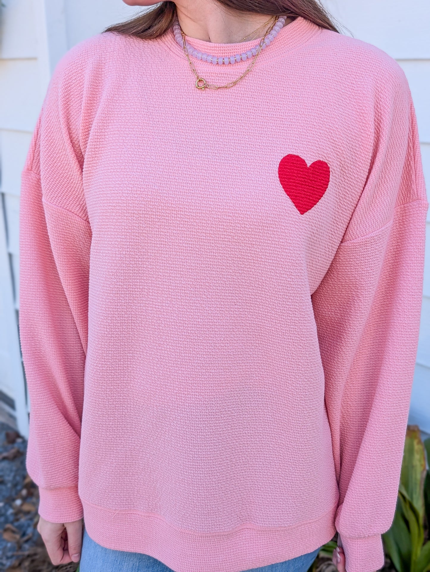 Pink Sweatshirt with Red Heart Graphic