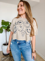 Melty Smiley Face Beige Cropped T-Shirt